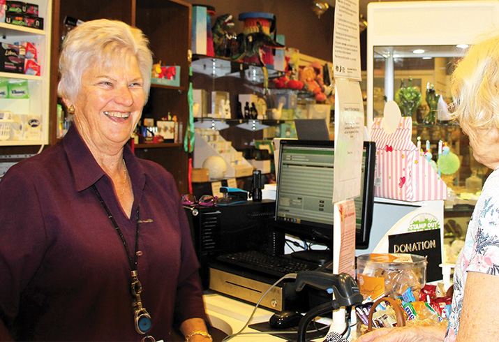 Mary serves a customer at the Rocking General Hospital gift shop