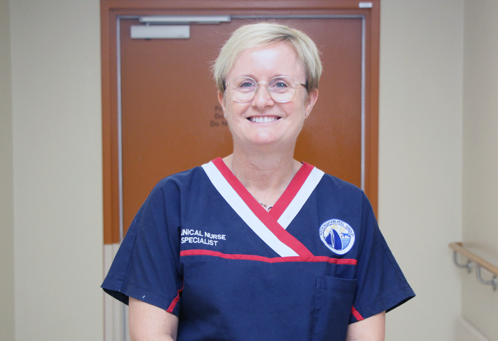 Rockingham General Hospital Clinical Nurse Specialist Sharon Deen stands in a corridor.